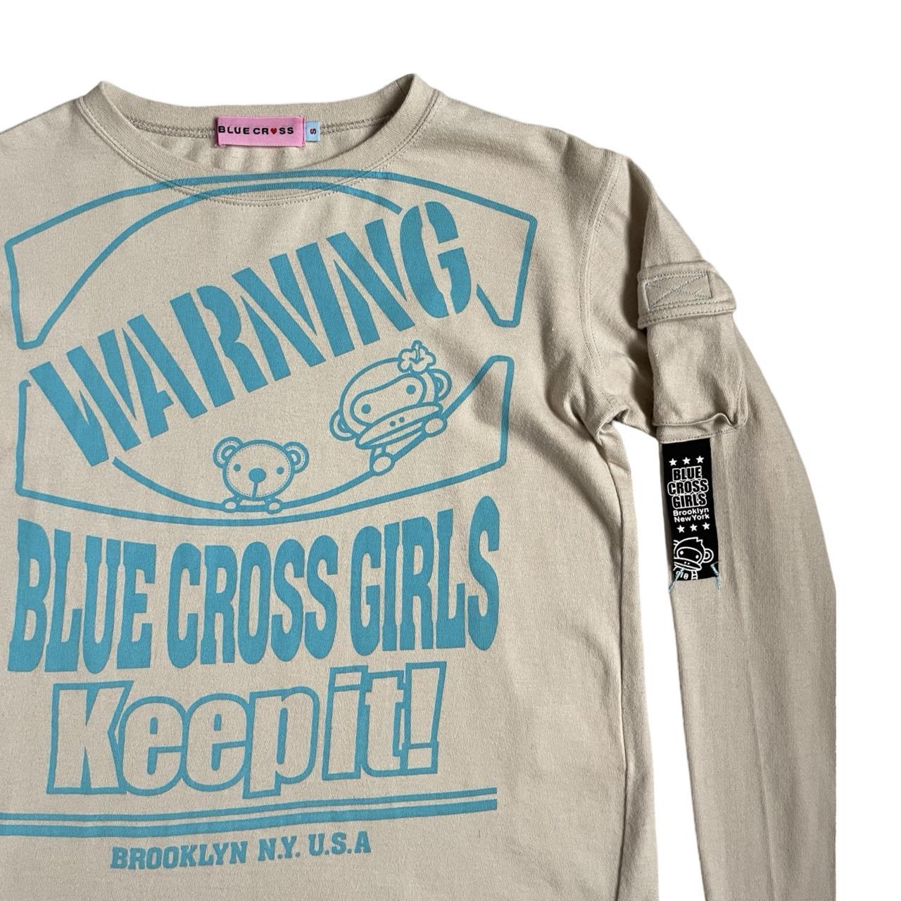 blue cross graphic longsleeve top